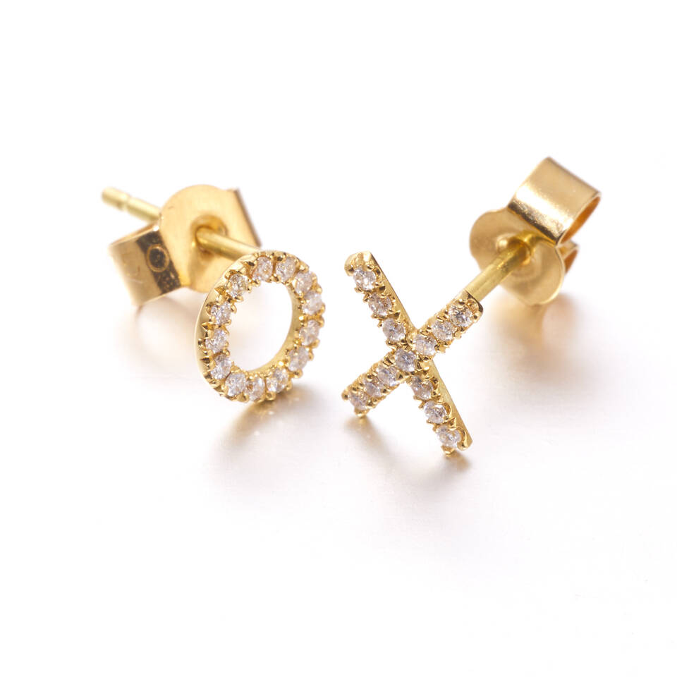 Pair of fine 18ct Welsh gold and Fairmined gold XO studs featuring brilliant round diamonds