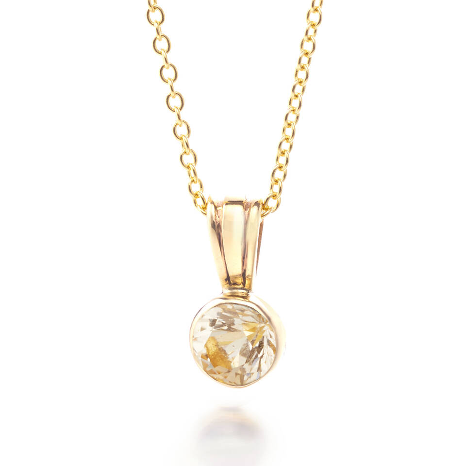 Handcrafted 100% Welsh gold pendant featuring a 5mm round diamond in a secure bezel setting on a gold trace chain.