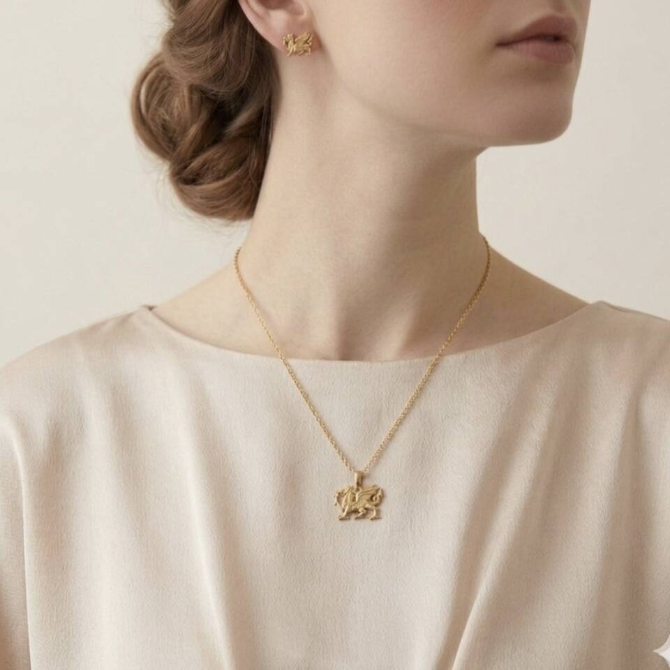 Lifestyle photo of a woman wearing the 20% Welsh gold dragon pendant necklace showing fit and chain length