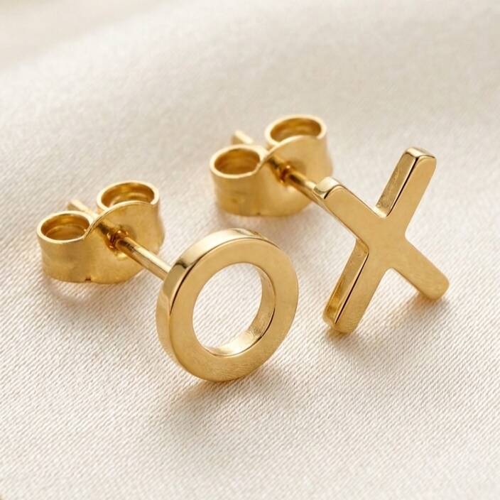 Side detail view of 18ct Eryri Welsh gold XO hugs and kisses stud earrings on post backings