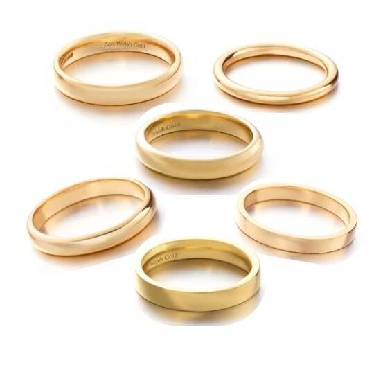 Six classic Welsh gold wedding bands displayed together, showcasing different ring profiles, widths, and interior hallmarks.