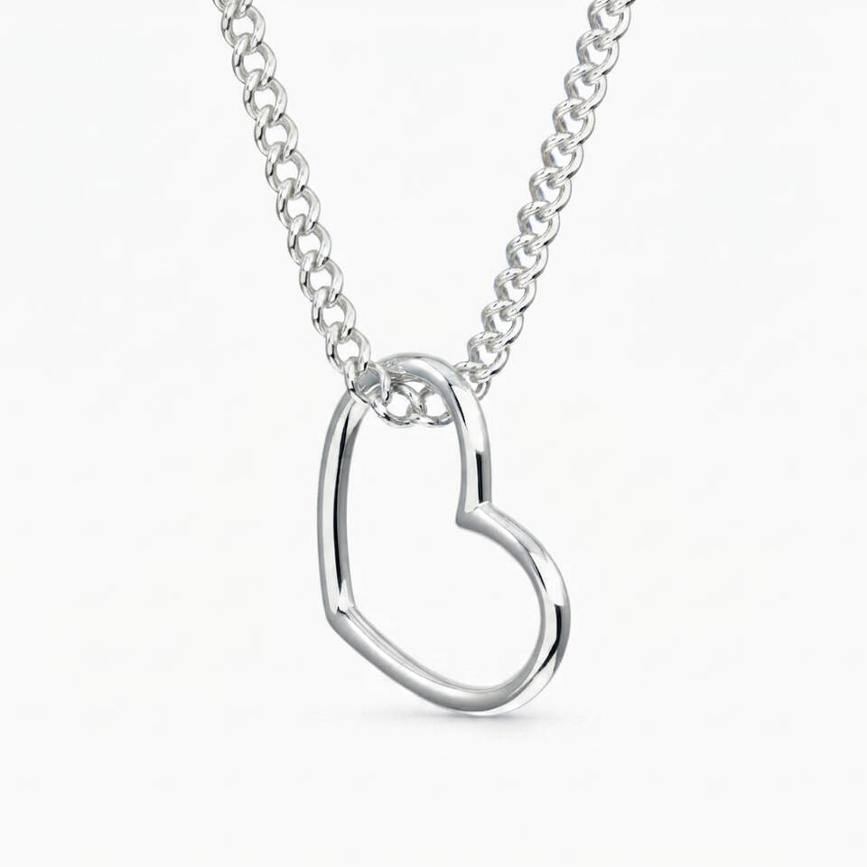 Handmade 5% Welsh silver open-heart outline pendant suspended on a delicate sterling silver chain