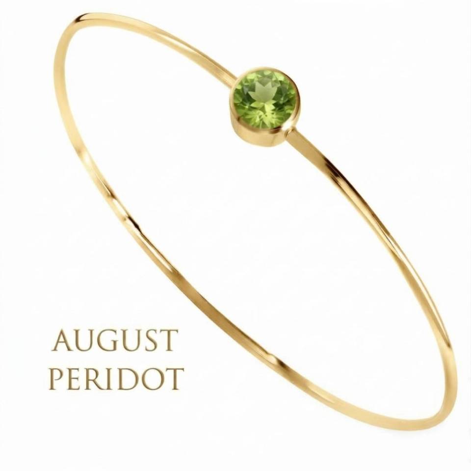 18ct Eryri Welsh gold 1.2mm wire bangle set with a natural August peridot gemstone