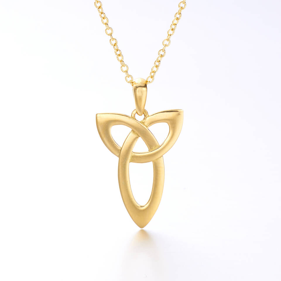 20% Welsh gold elongated Trinity Knot pendant on an 18 inch recycled gold trace chain on a white background