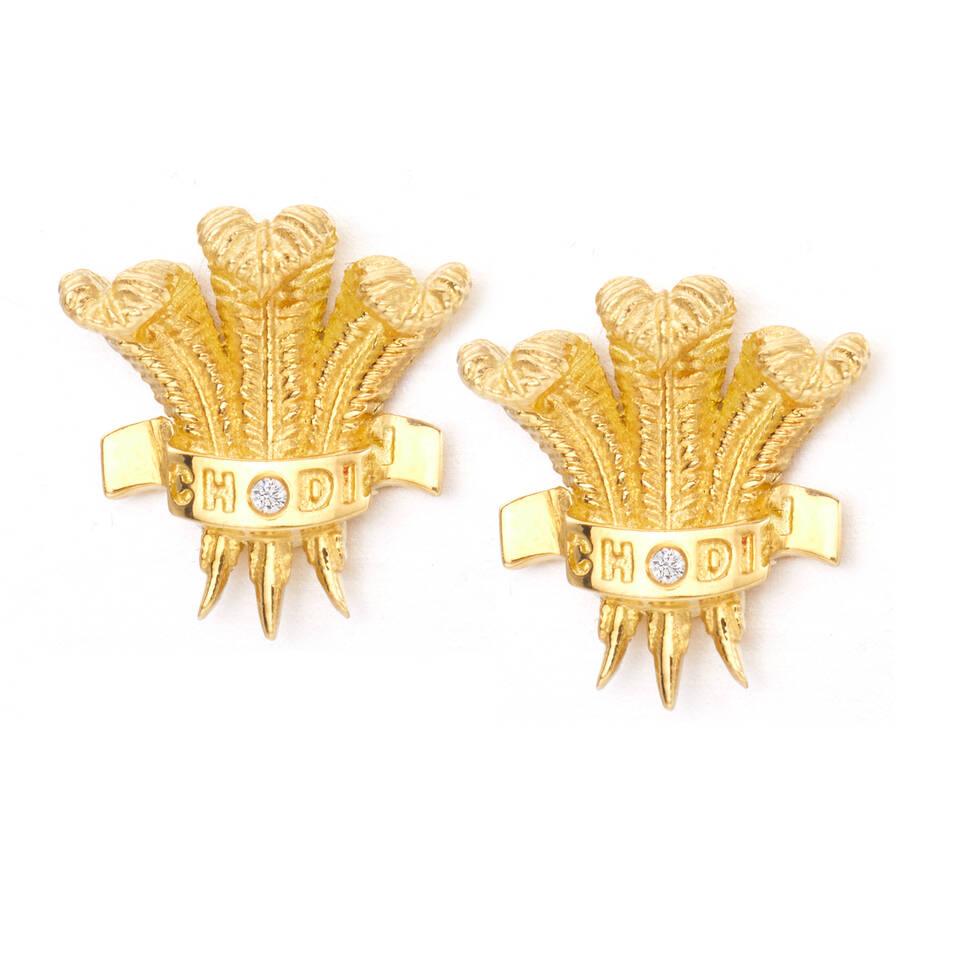 Isolated studio view of fine 100% pure 18 carat Welsh gold Prince of Wales Feathers earrings studded with diamonds
