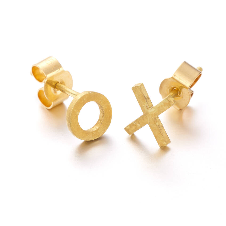 20% Welsh gold and Fairmined gold XO stud earrings set on a white background